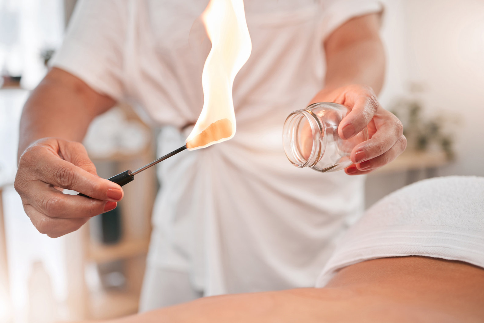 Fire Massage, Flame and Heating for Cupping Spa  for Holistic Wellness with Glass Jars. Beauty, Luxury Skincare and Body Treatment of a Physical  Session to Find Relax, Peace and Health